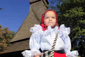 Maramures UNESCO wooden church traditional girl